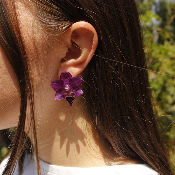 Pendientes orquídea morada pegados